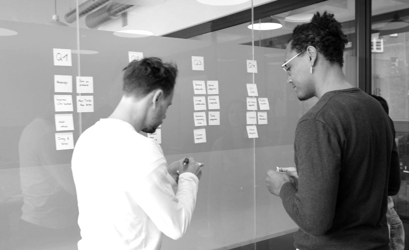Financial analyst reviewing automated risk assessment reports